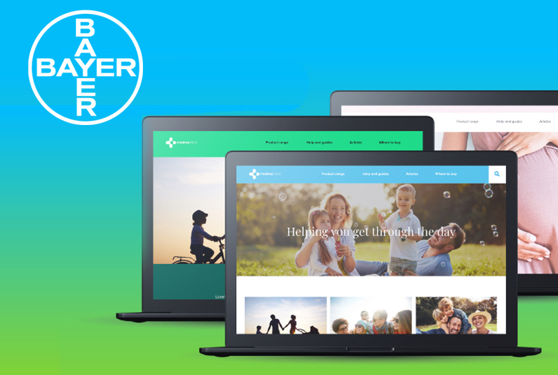 Bayer logo on blue and green brand gradient with 3x laptops showing their brand websites